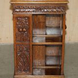 Victorian carved oak revolving library, circa 1880.