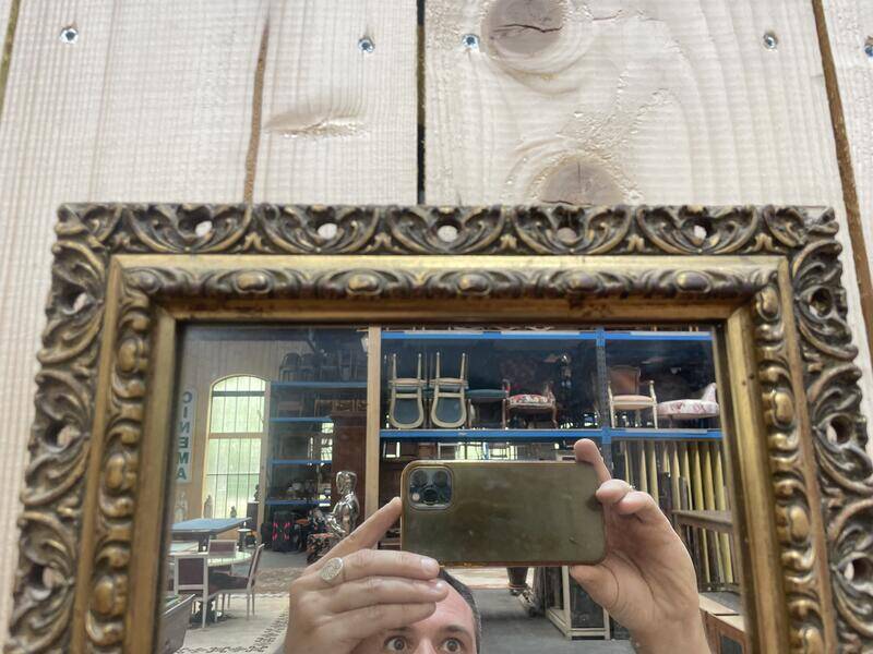 Petit miroir d'entre deux en bois doré