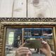 Petit miroir d'entre deux en bois doré
