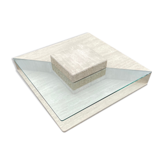 Coffee table in travertine and glass