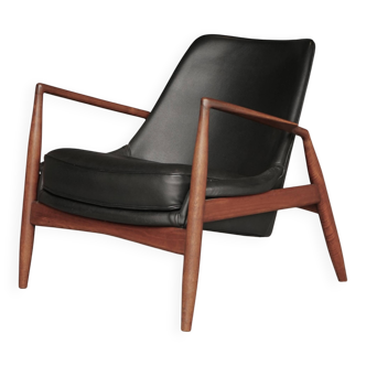 Fauteuil Seal en cuir et teck Ib Kofod-Larsen pour OPE, Suède, années 1960.
