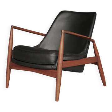 Fauteuil Seal en cuir et teck Ib Kofod-Larsen pour OPE, Suède, années 1960.