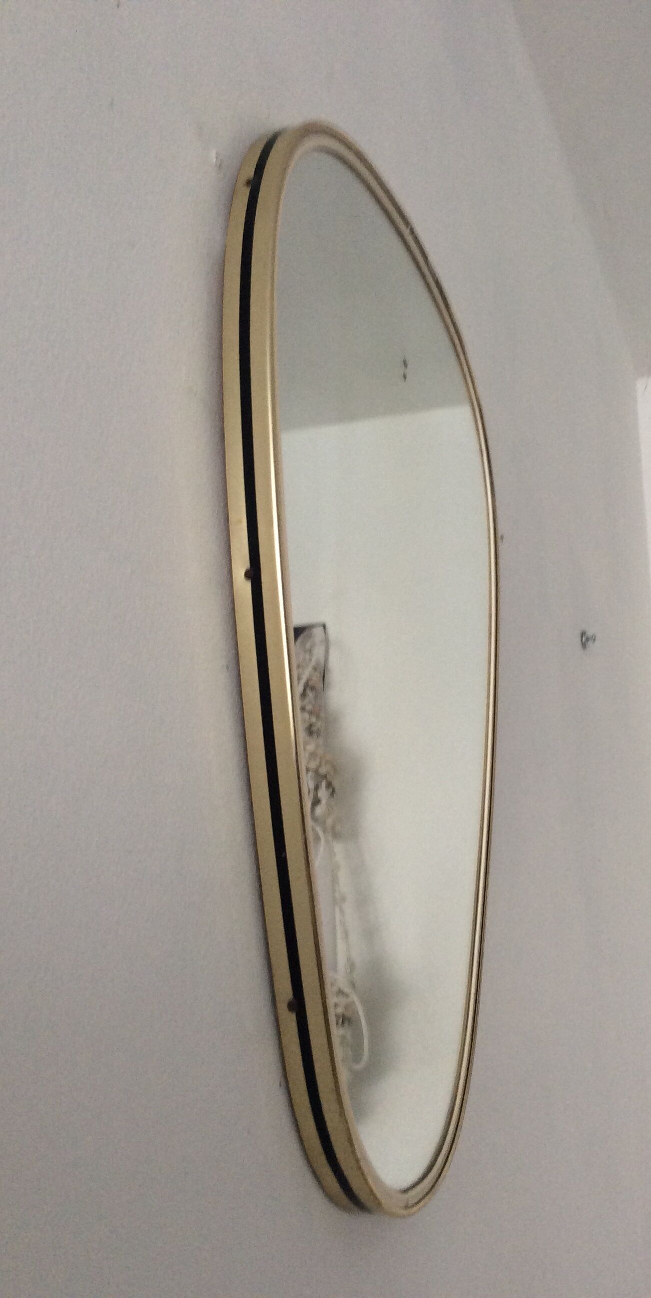 Asymmetrical free-form mirror from the 70s