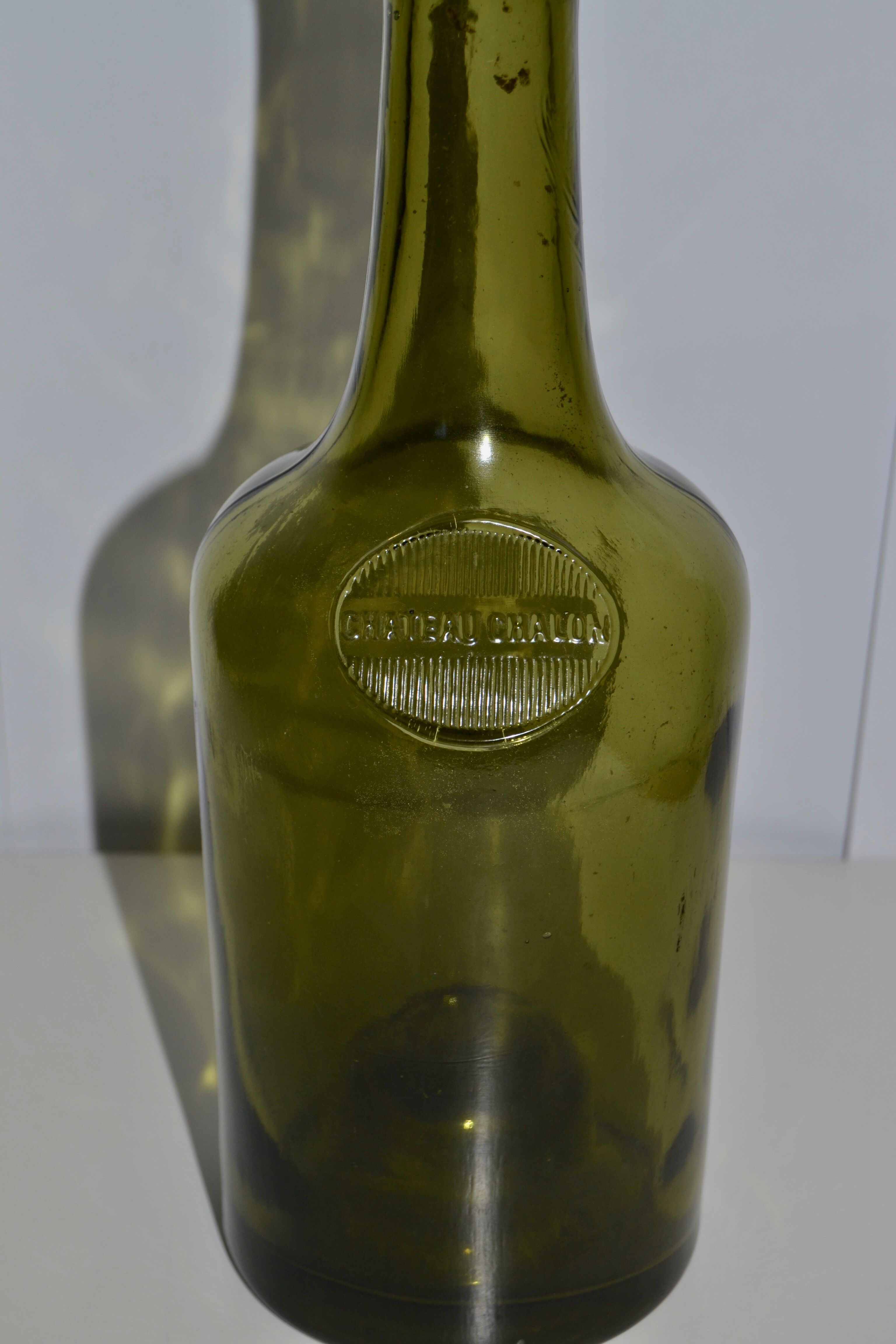Château Chalon green glass bottle