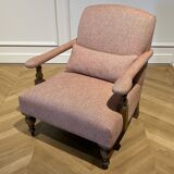 Wooden armchair and fabric with red chevron pattern with casters