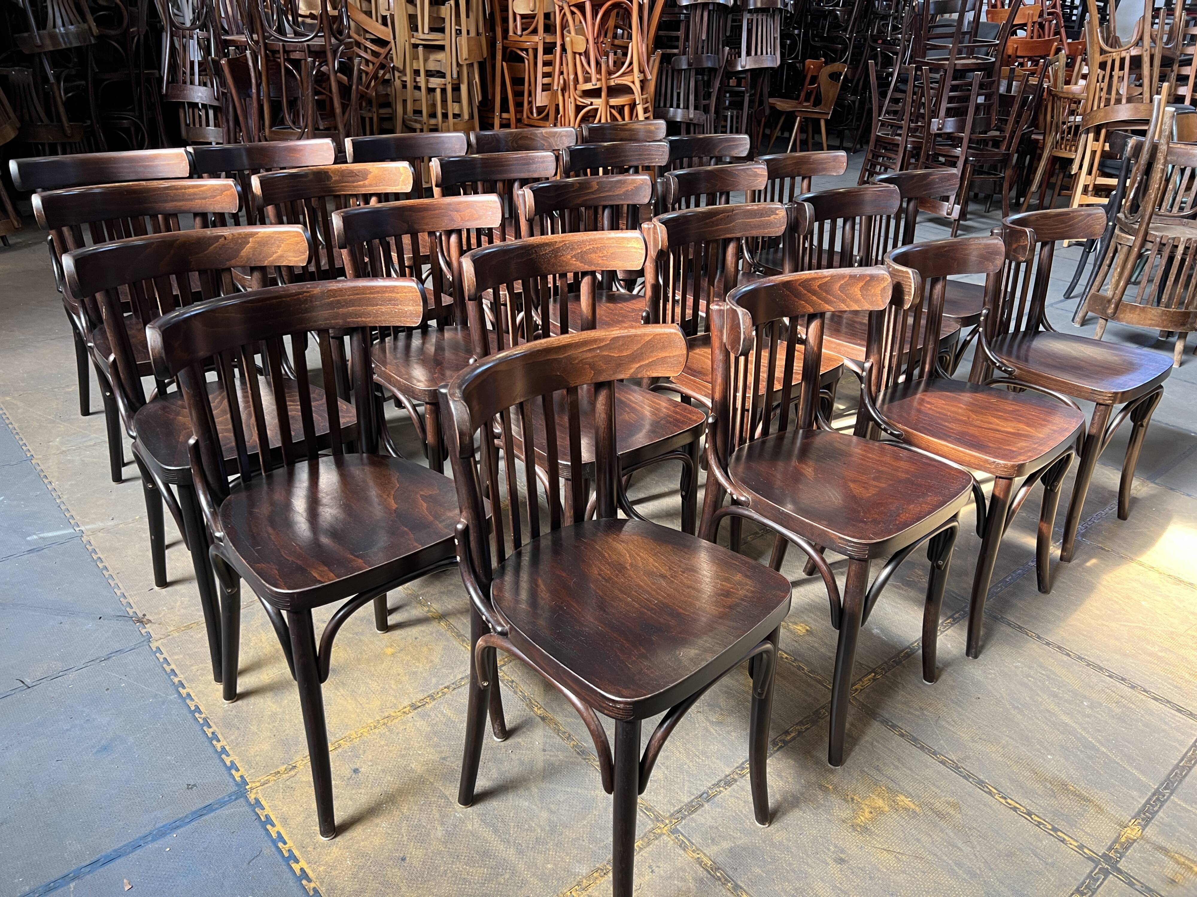 Set of 24 restored bistro chairs.
