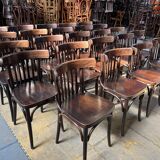 Set of 24 restored bistro chairs.