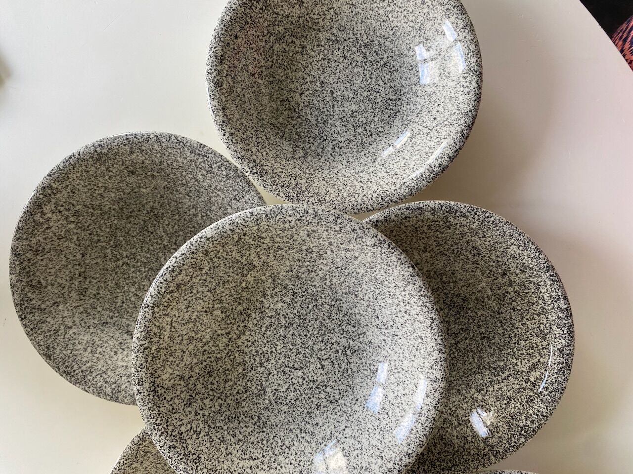 Set of 8 hollow plates in Italian speckled ceramic