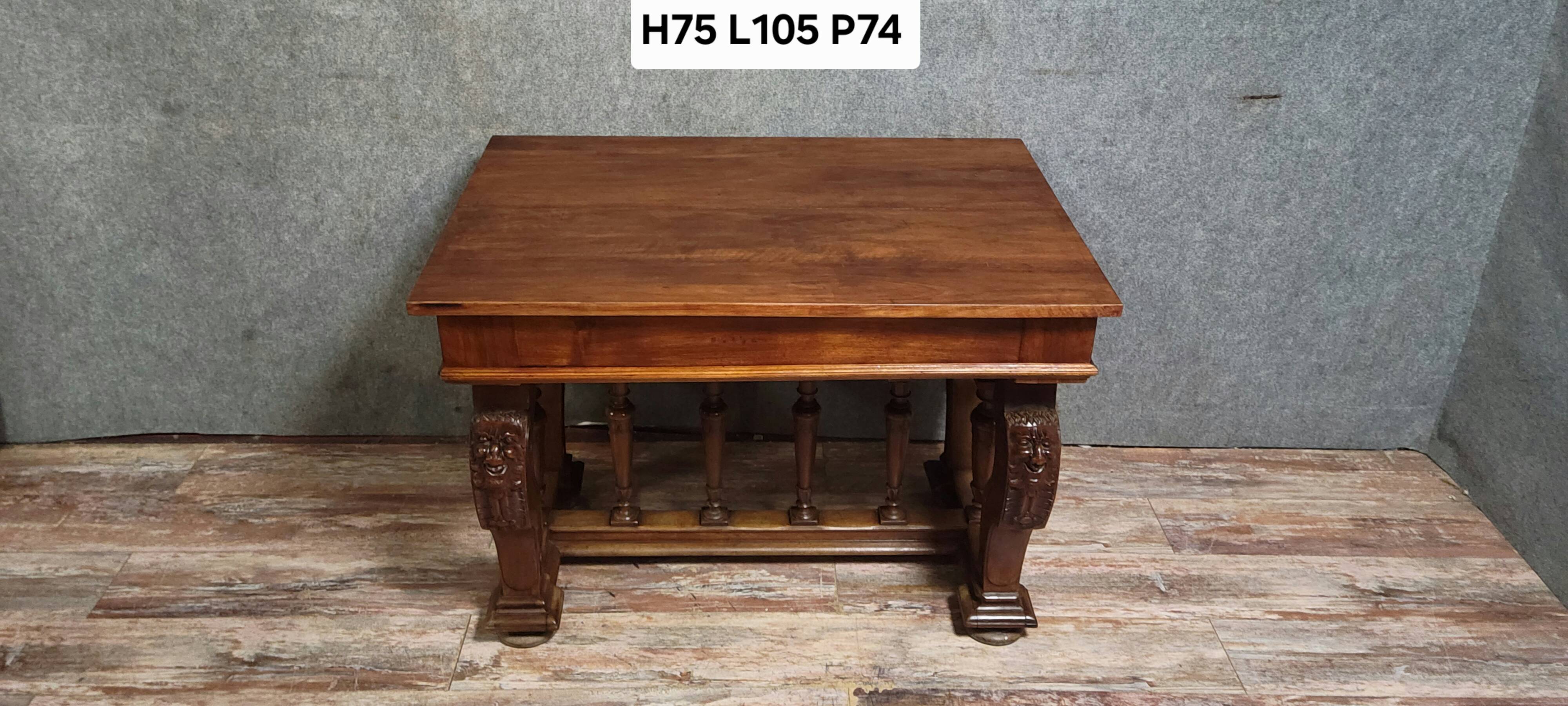 Antique desk in Renaissance style made of walnut from the late 19th century.