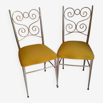 Pair of vintage golden designer chairs from the 50s