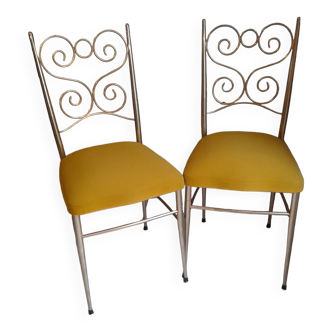 Pair of vintage golden designer chairs from the 50s