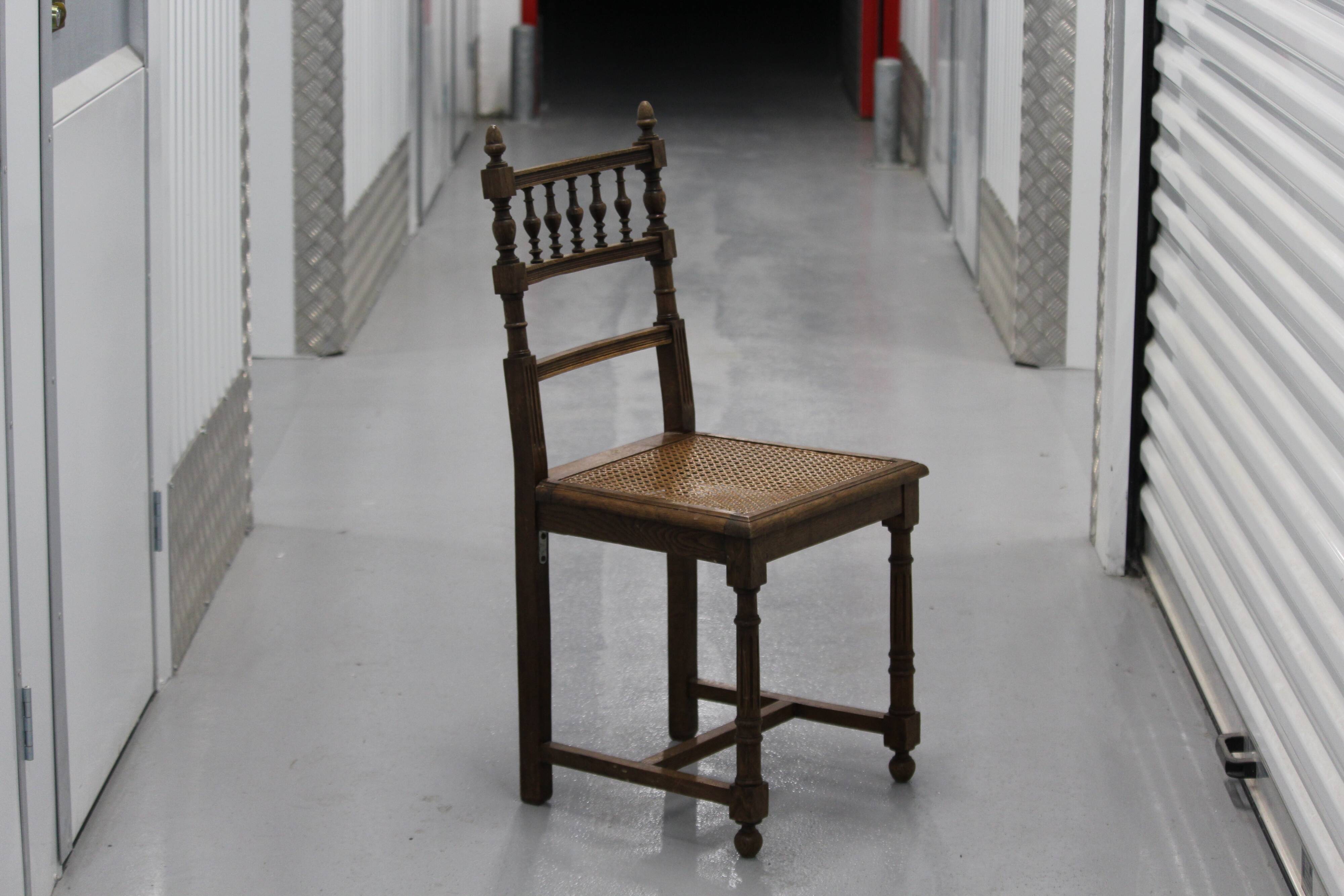 Pair of wooden caned chairs