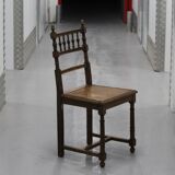 Pair of wooden caned chairs