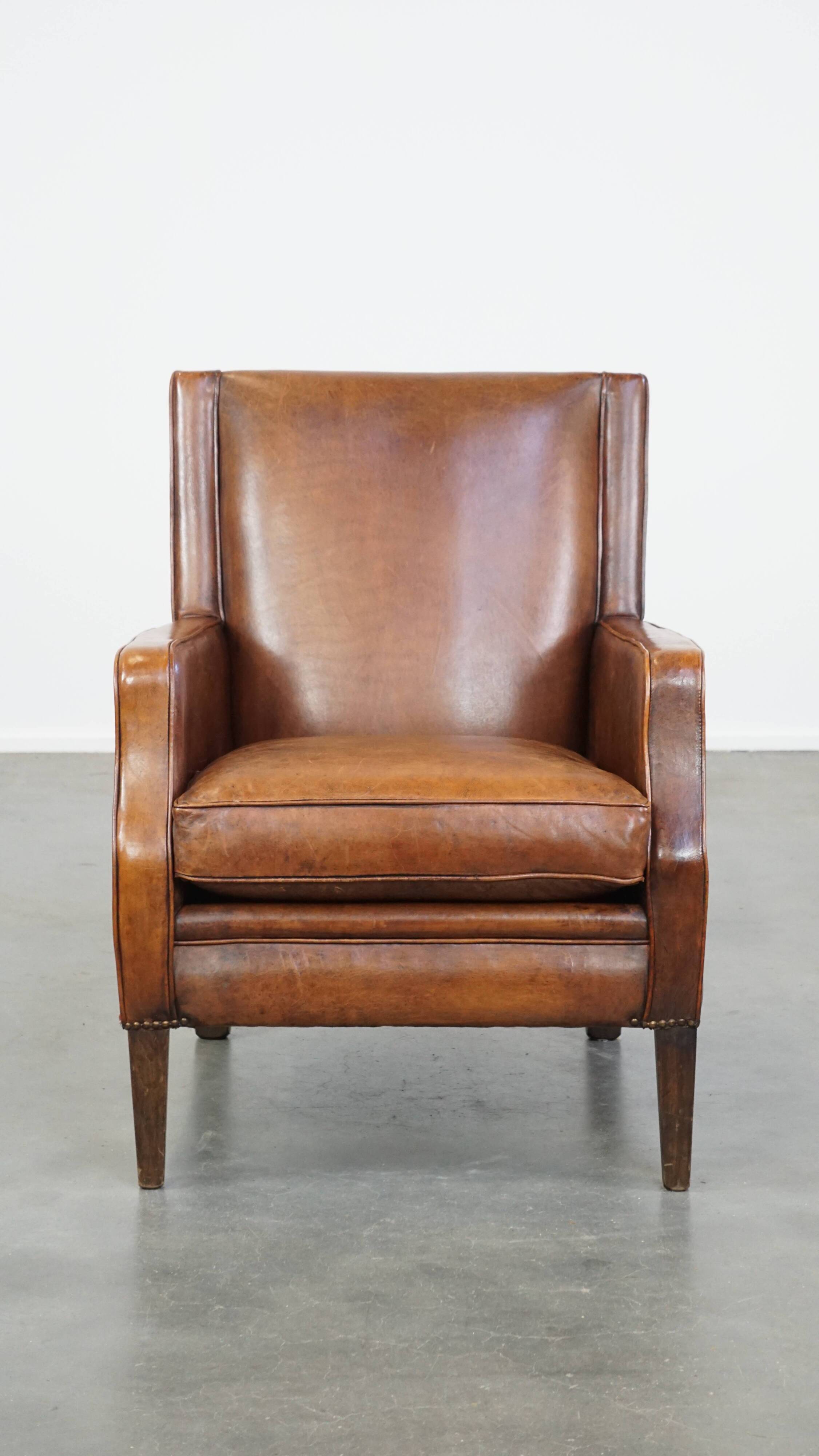 Sheepskin armchair with a refined Art Deco design