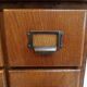 Antique oak apothecary cabinet with drawers