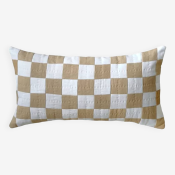 Beige checkered cushion