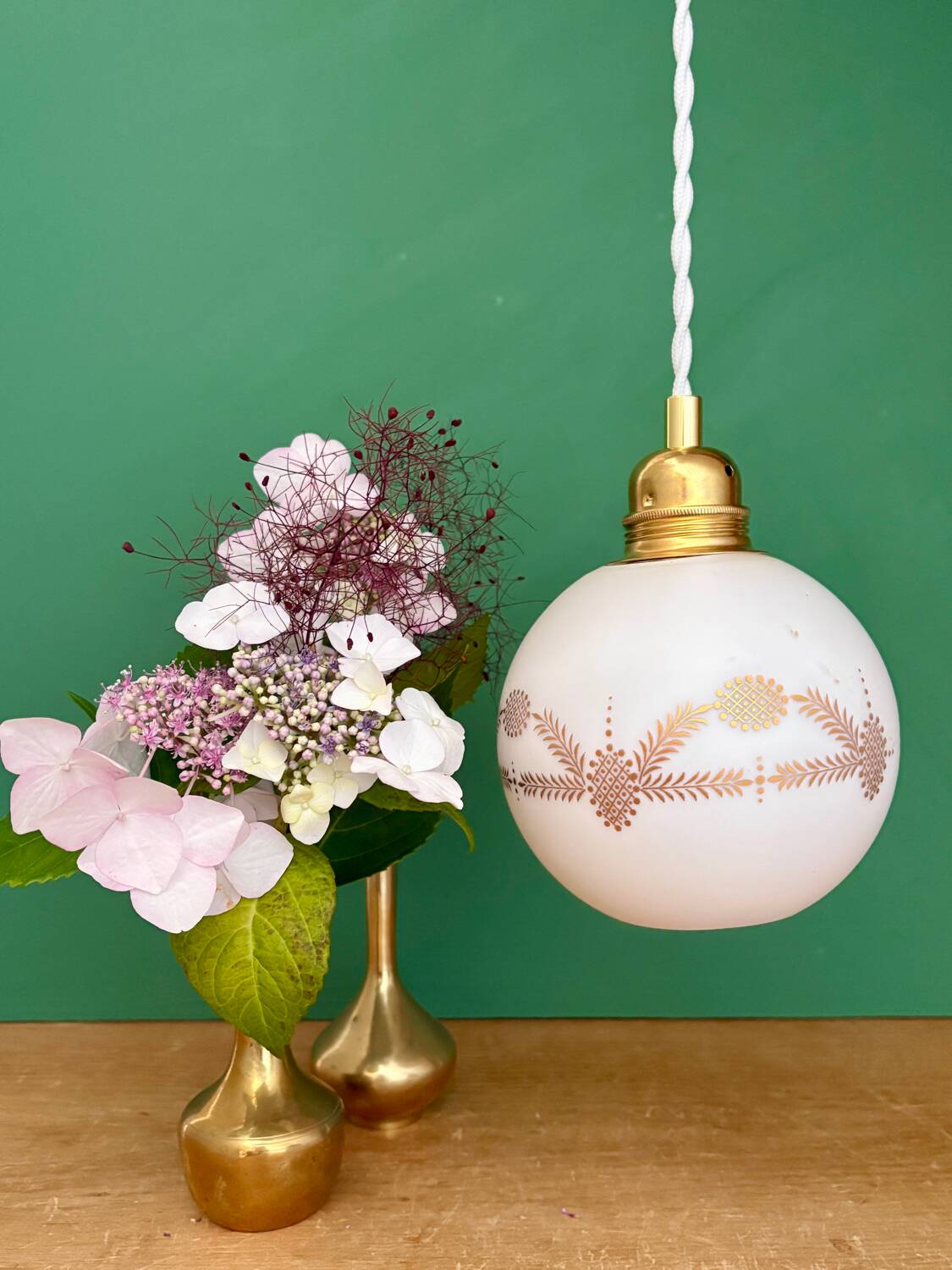 Vintage globe pendant light in white opaline with gold designs