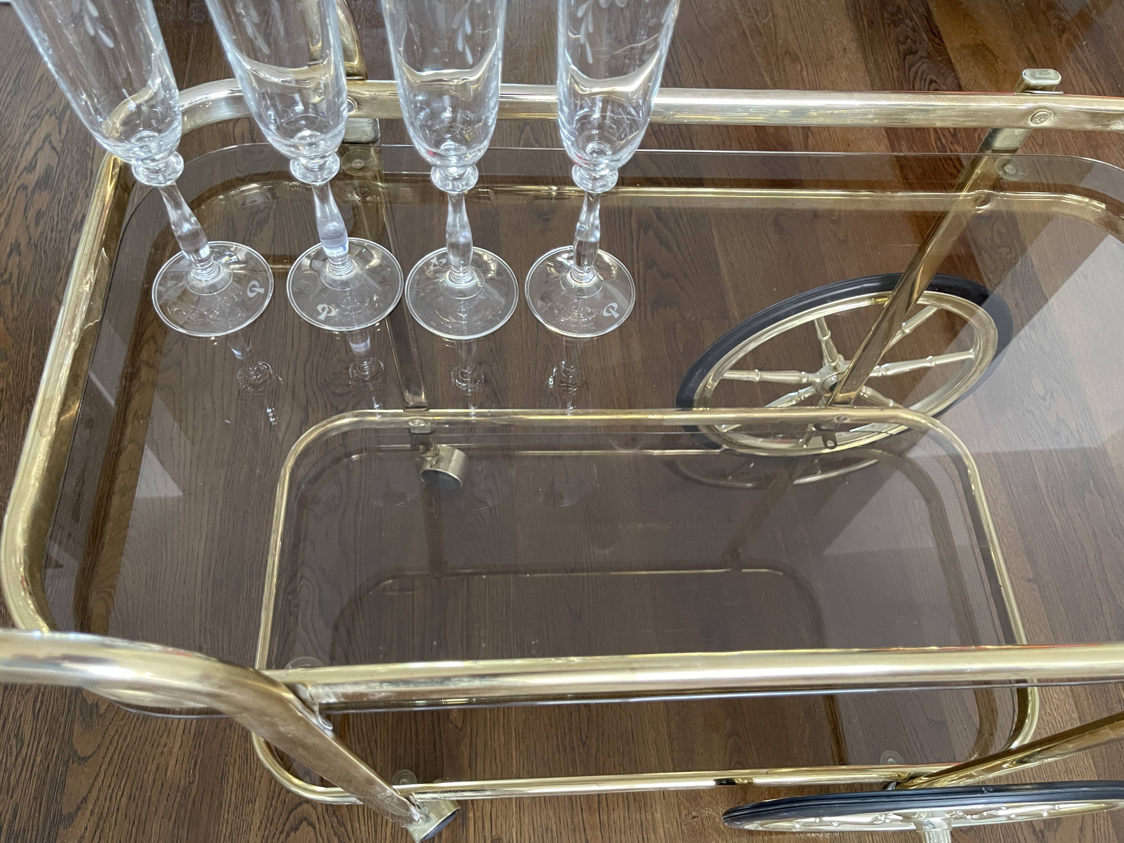 Brass and smoked glass bar trolley, 2 trays