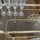 Brass and smoked glass bar trolley, 2 trays