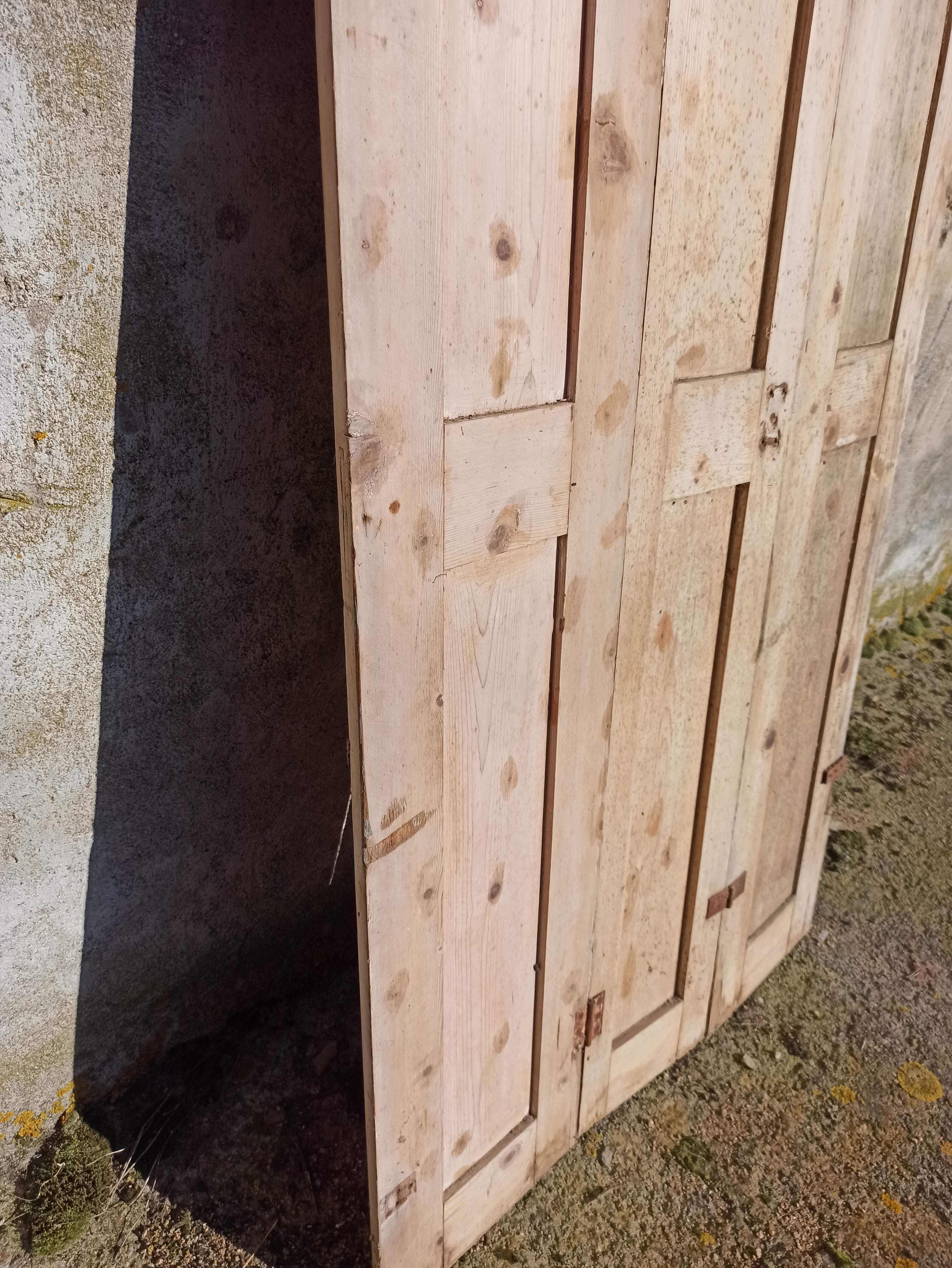Old trio of wooden screen doors