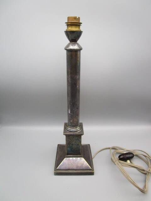 Old lamp base in silvered bronze, column shape