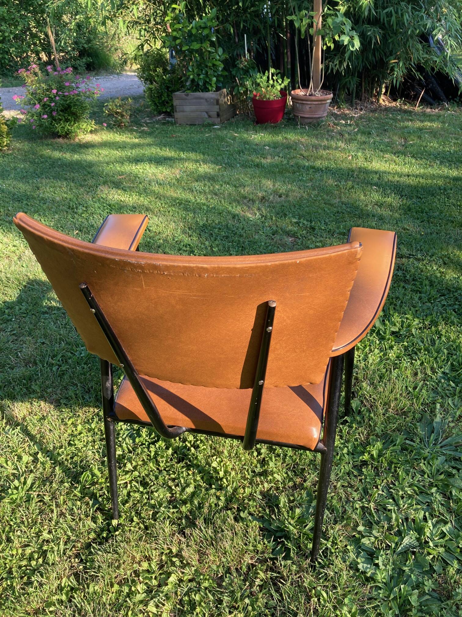 Rare light brown leatherette armchair, by "Colette Gueden", designer from the 50s