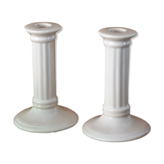 Pair of cream ceramic candlesticks