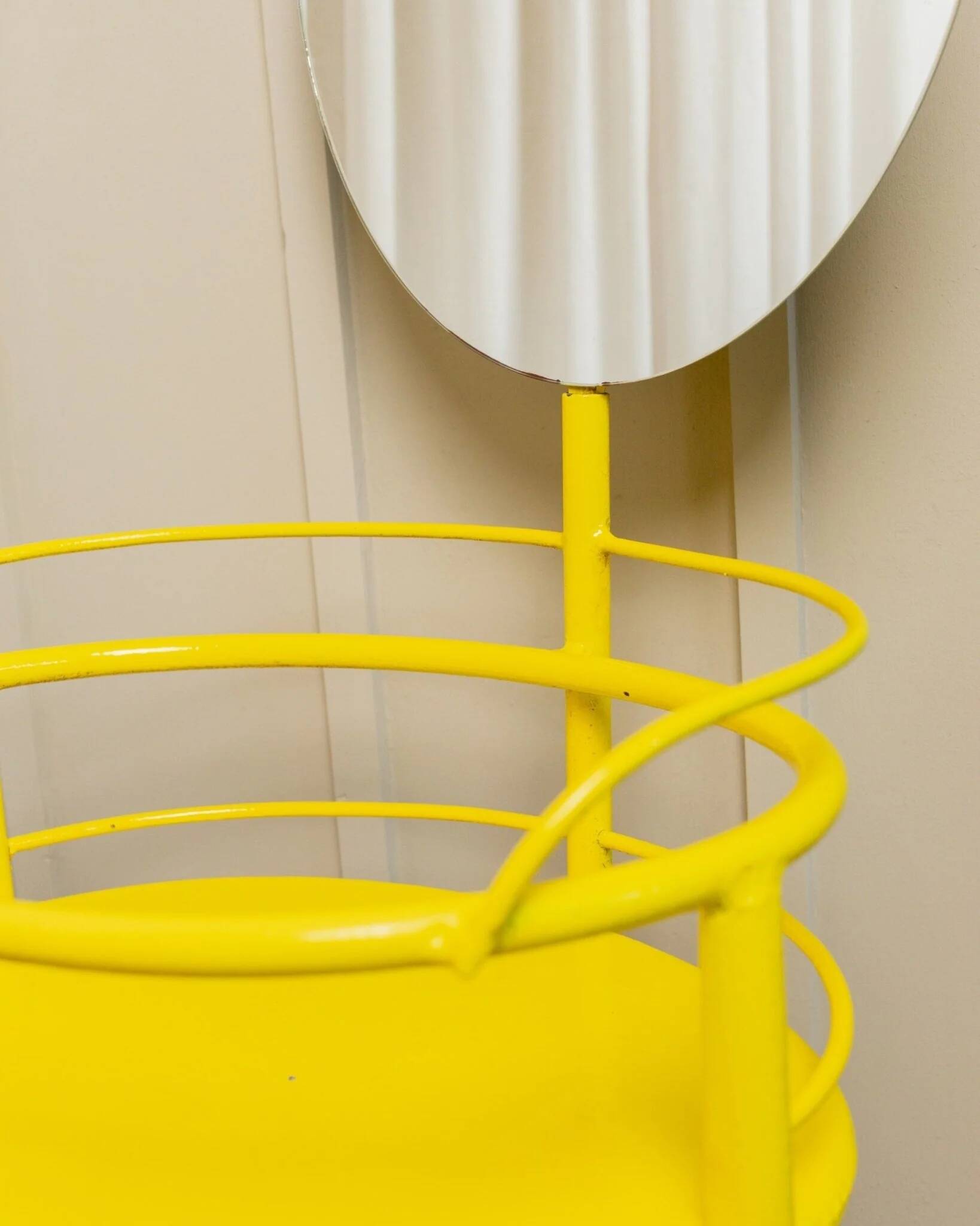 Yellow metal side table with swiveling oval mirror and two tray shelves, vintage 1960s Italy
