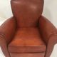 Large club chair in cognac leather