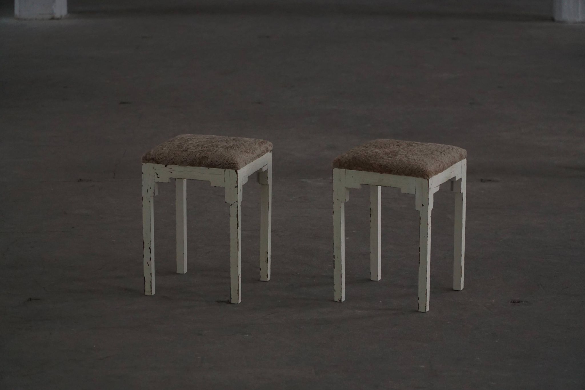 A pair of antique Danish stools, seats in lambswool, late 19th century.