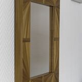 Mirror with straw marquetry frame