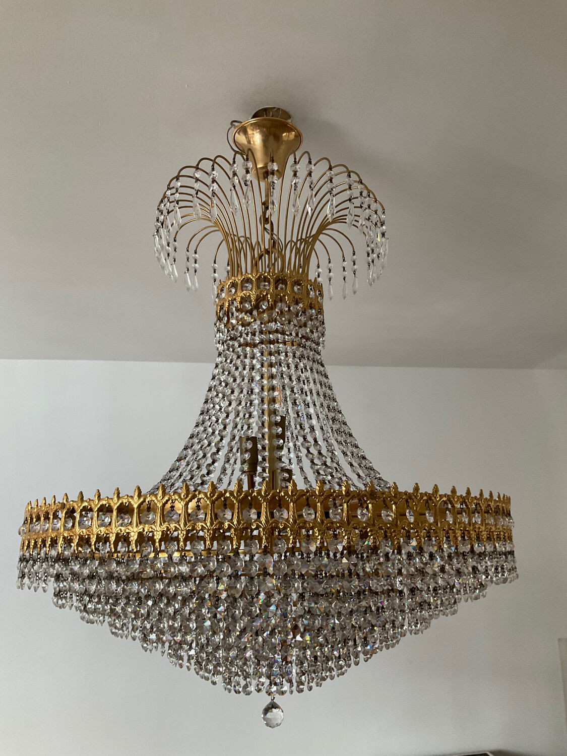 Chandelier cascade of tassels and brass