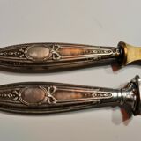 Paper cut with a stamp handle punches boar heads