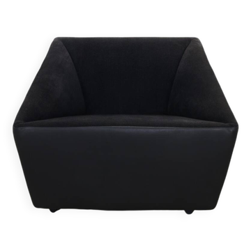 Postmodern Lounge Chair in Leather on wheels by COR