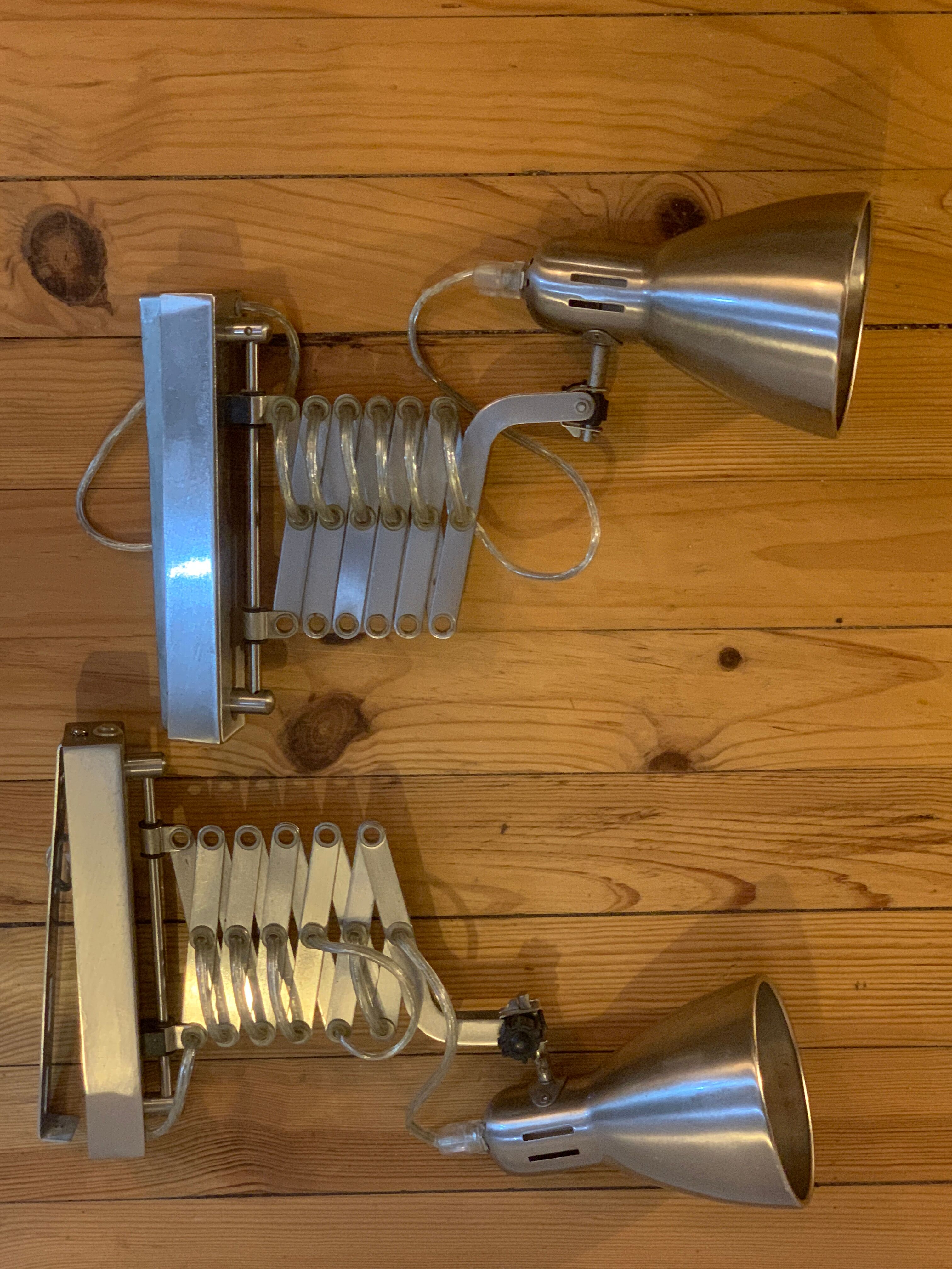 Industrial style retractable wall sconces