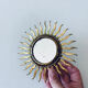 Miroir soleil doré