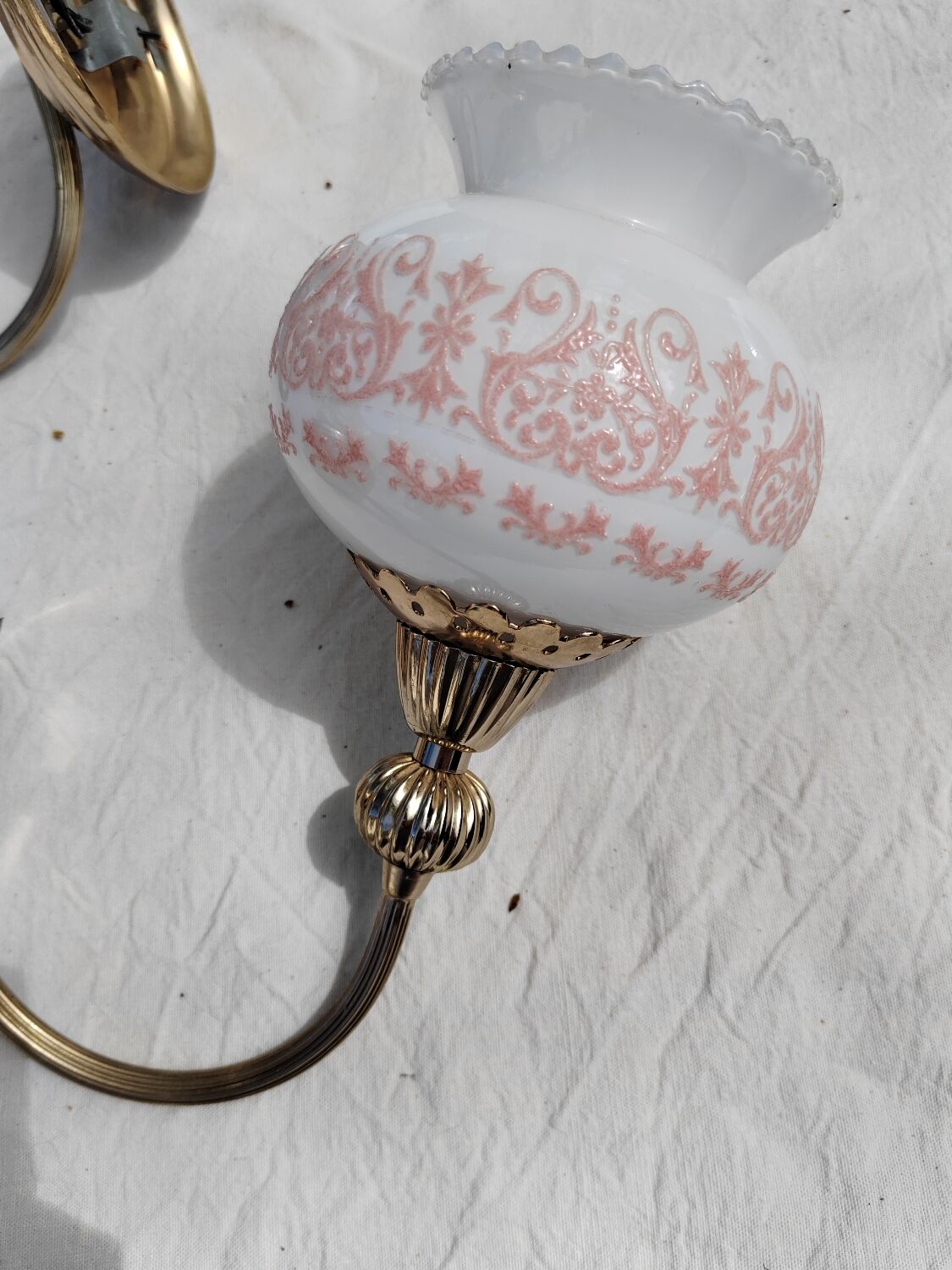 Pair of wall sconces with floral lampshades