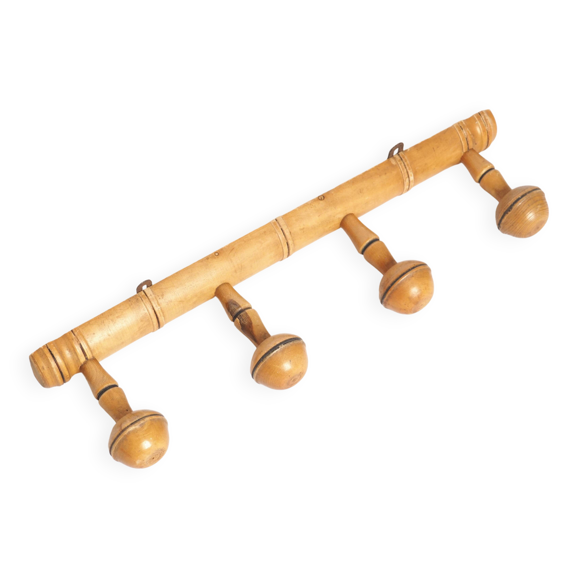 Light wood coat hooks 1900