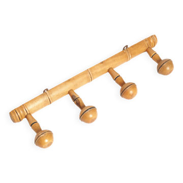 Light wood coat hooks 1900