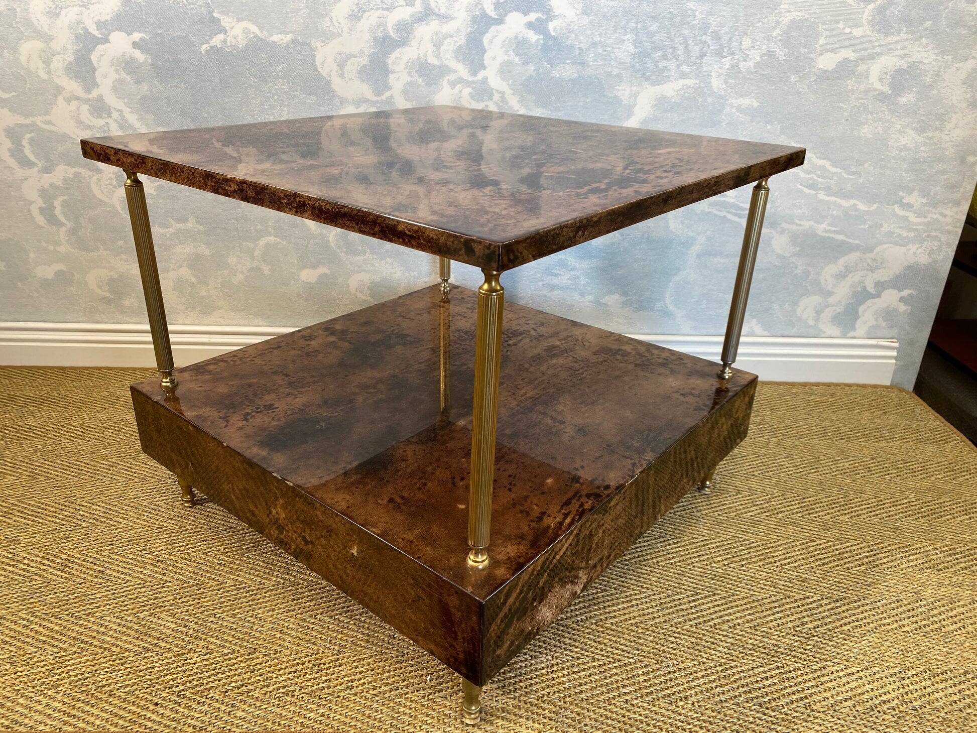 Aldo Tura side table in hazel brown tones with brass legs and bottom drawer