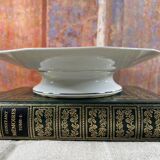 Cup on foot display in Limoges porcelain