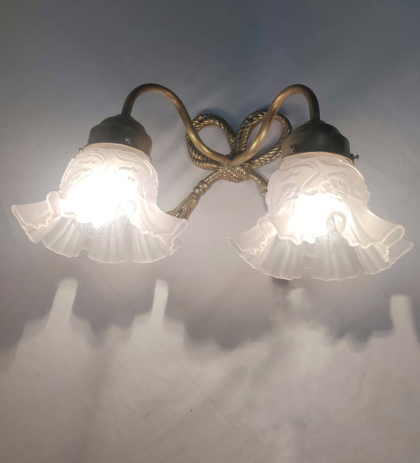 Bronze and crystal wall light. France, 1950s.