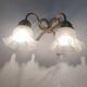 Bronze and crystal wall light. France, 1950s.