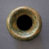 Wabi-sabi artisanal stoneware vase in green and earth tones.