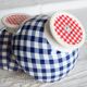 Large vintage white earthenware bowl with blue gingham pattern