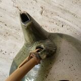 Handmade ceramic teapot with green fish and bamboo
