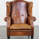 Fauteuil à oreilles en cuir de mouton vintage de style anglais