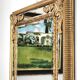 Grand miroir italien doré en bois à verre biseauté