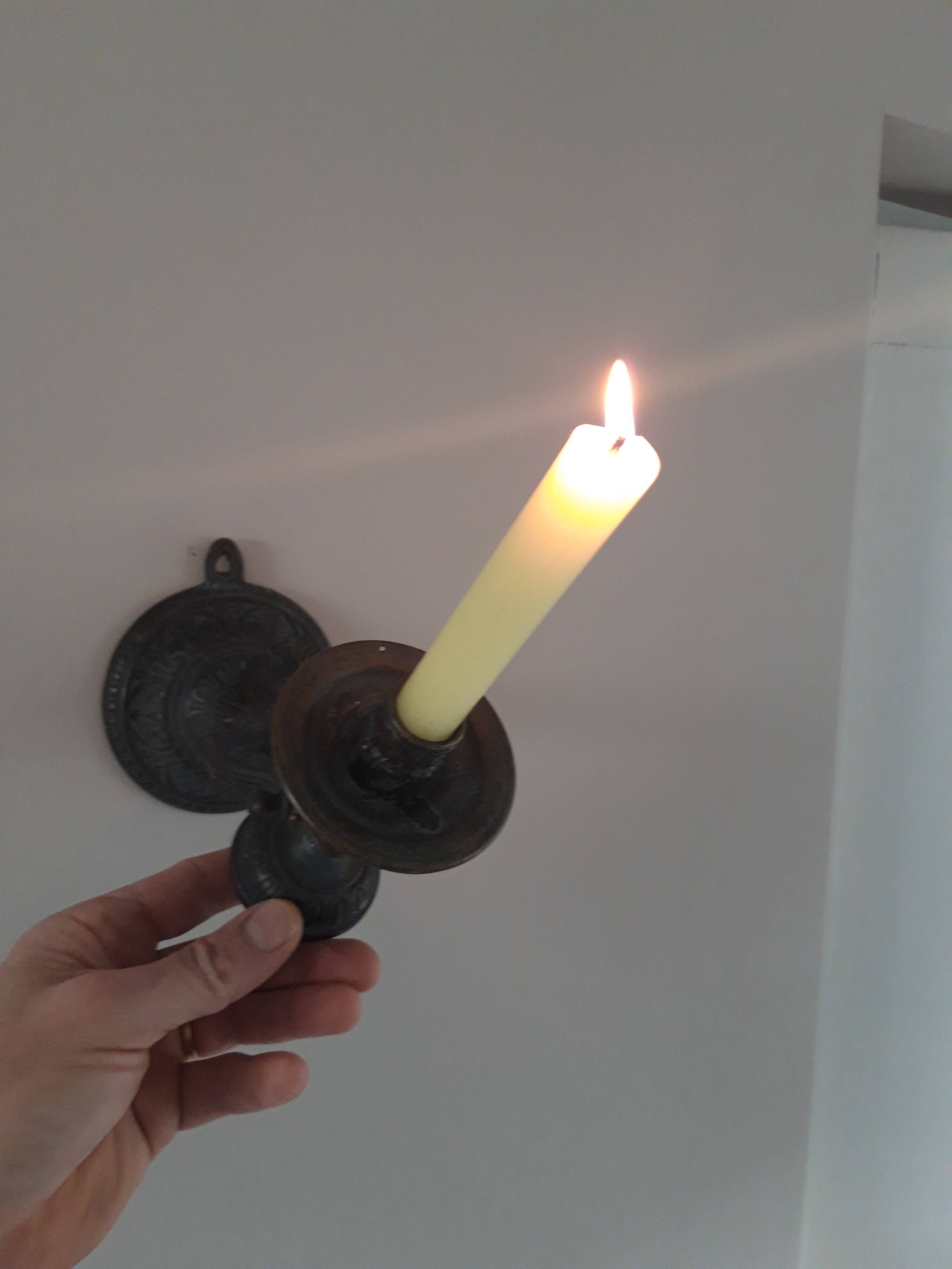 Bronze pendulum candle holder