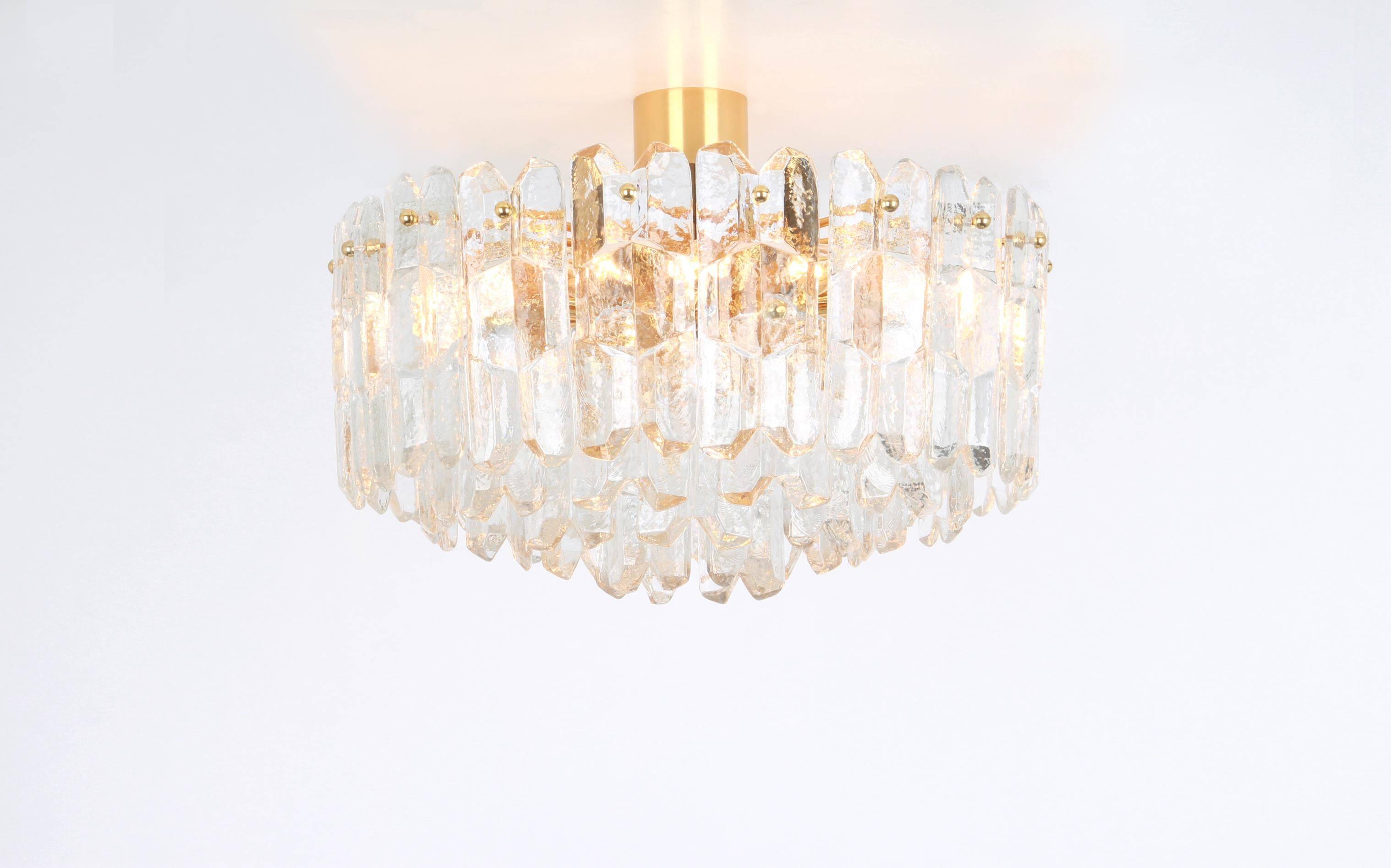 Magnificent luminaire in gilded brass and crystal glass Palazzo, Kalmar, Austria, 1970.